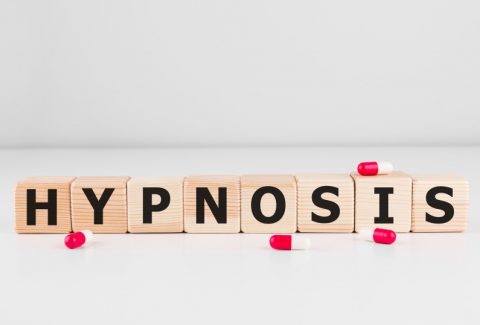 hypnosis-word-made-with-building-blocks-with-pills