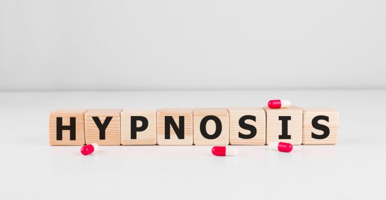 hypnosis-word-made-with-building-blocks-with-pills
